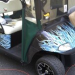 Customer requested propane flames, so we designed a custom wrap in blue tones with a "blown-back" look. Custom Golf Cart wrap